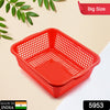 Multipurpose kitchen sink basket for draining water from fruits and vegetables.