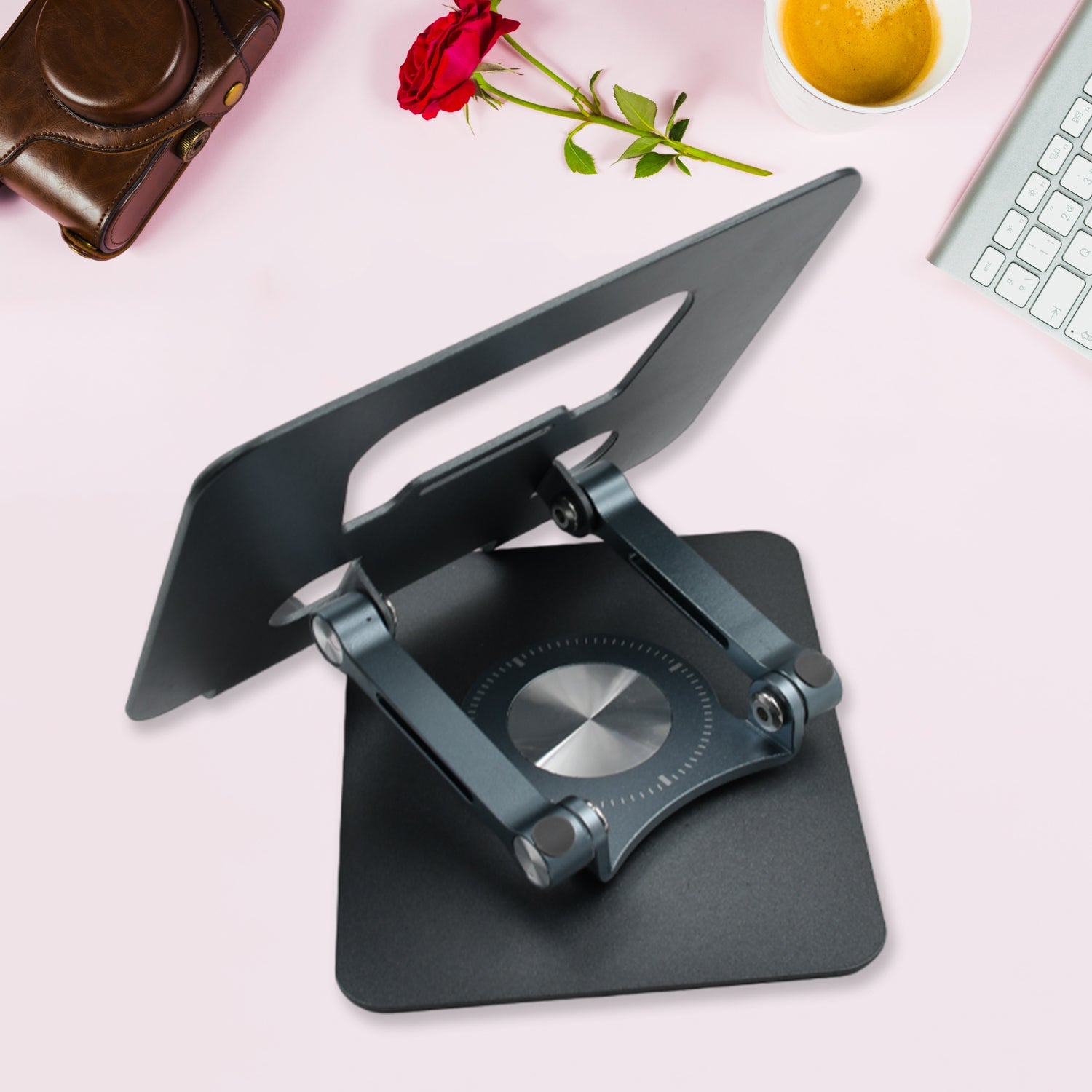 Ergonomic 360° rotating tablet stand with adjustable height, perfect for desk use.