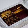 Decorative serving platter for dry fruits and mukhvas, perfect for parties and special events. Elegant design.