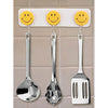 Pack of 3 self-adhesive smiley hooks for home use.