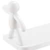 Wall-mounted shelf with human figurine