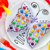 Butterfly-shaped silicone baking cups, safe for oven and microwave, for muffins and chocolate.