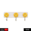 Cute smiley wall hooks with adhesive backing.