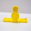 Yellow mobile holder for wall socket.