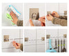 Plastic self-adhesive hooks, ideal for use in various settings.