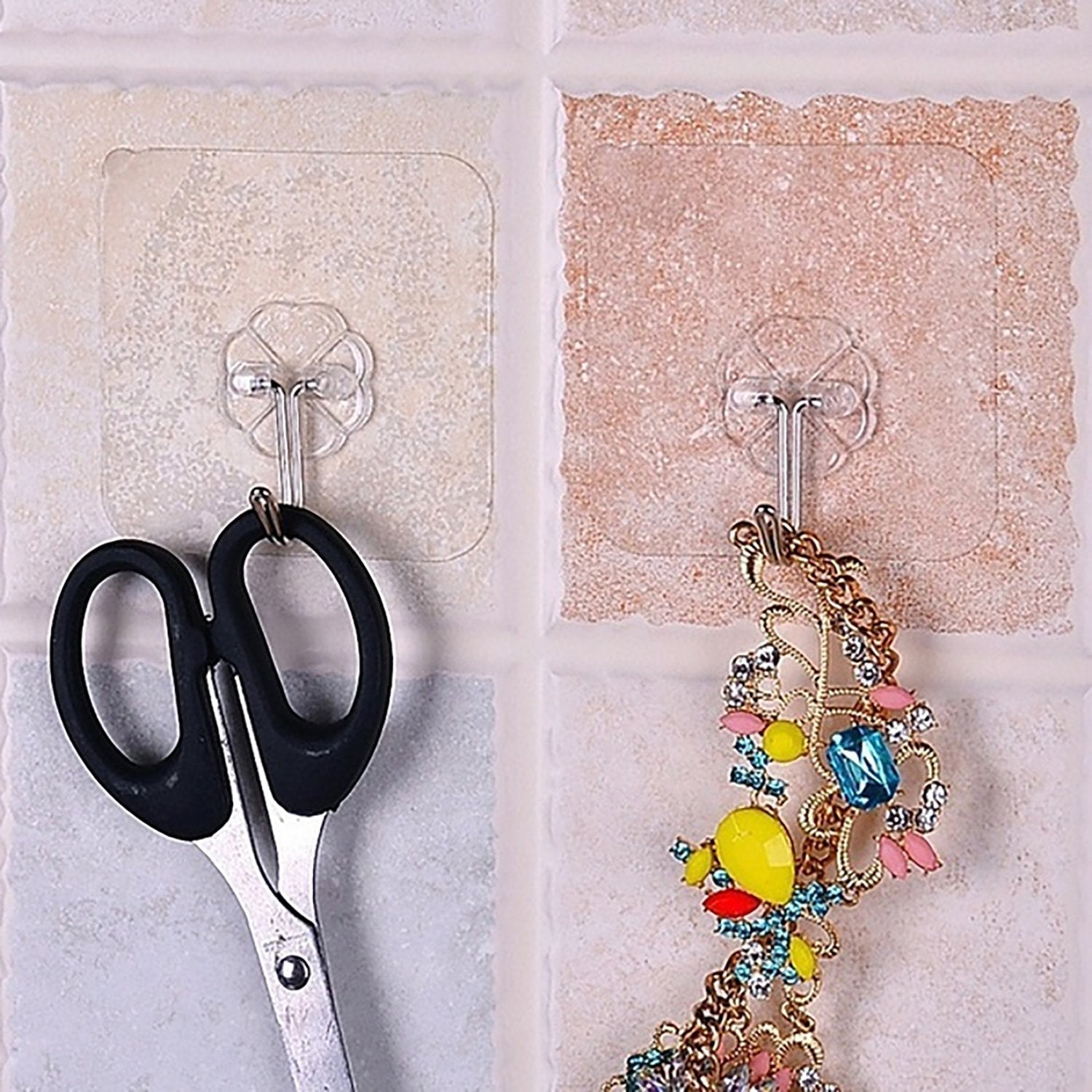 Small strong adhesive wall hooks in stainless steel for versatile use