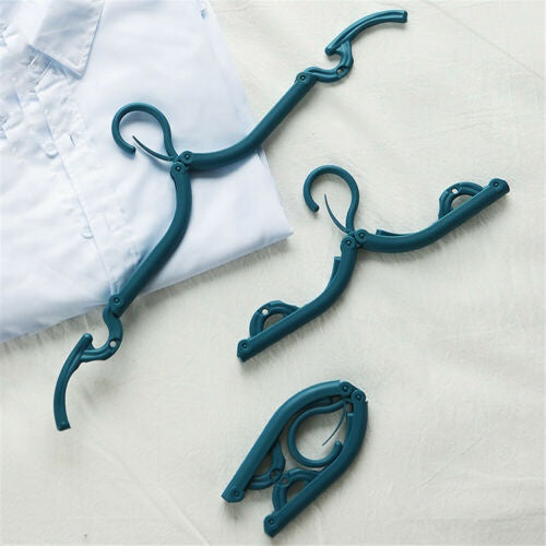 Compact and foldable plastic hanger, multicolor, space-saving design for travel.